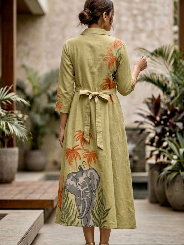 Back view light olive green collared tunic dress, tie waist, jungle elephant foliage print