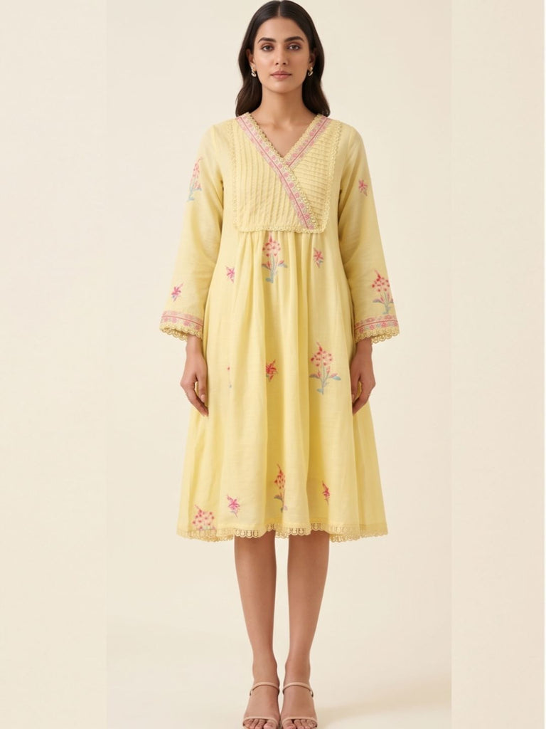 Lemon yellow cotton Angrakha dress with pink V-neck border, floral motifs, and lace hem