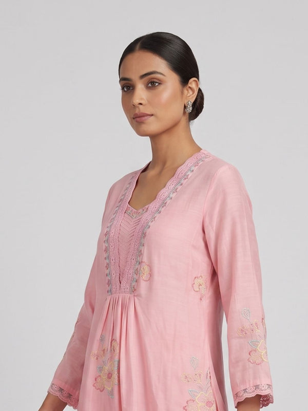 Baby pink embroidered cotton V-neck dress with 3/4 sleeves and scalloped lace trim