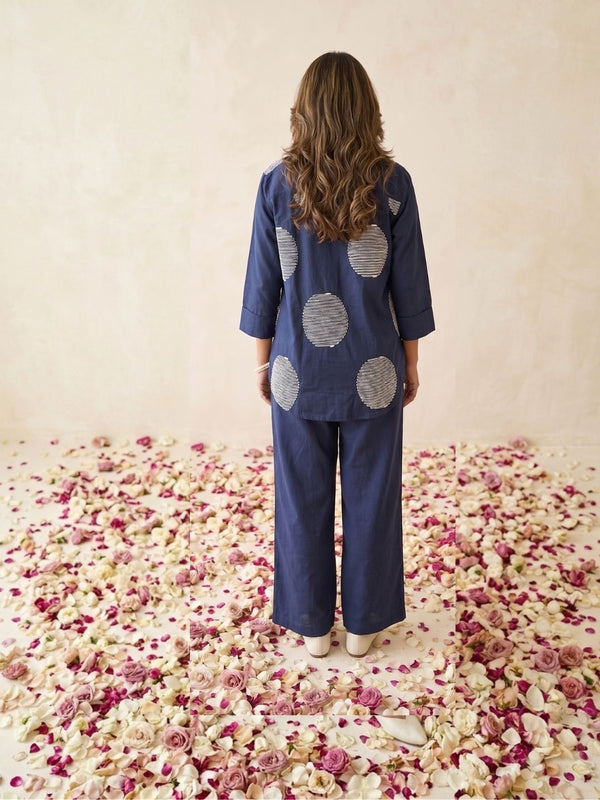 Indigo high-low button-front shirt with abstract dot embroidery, back view